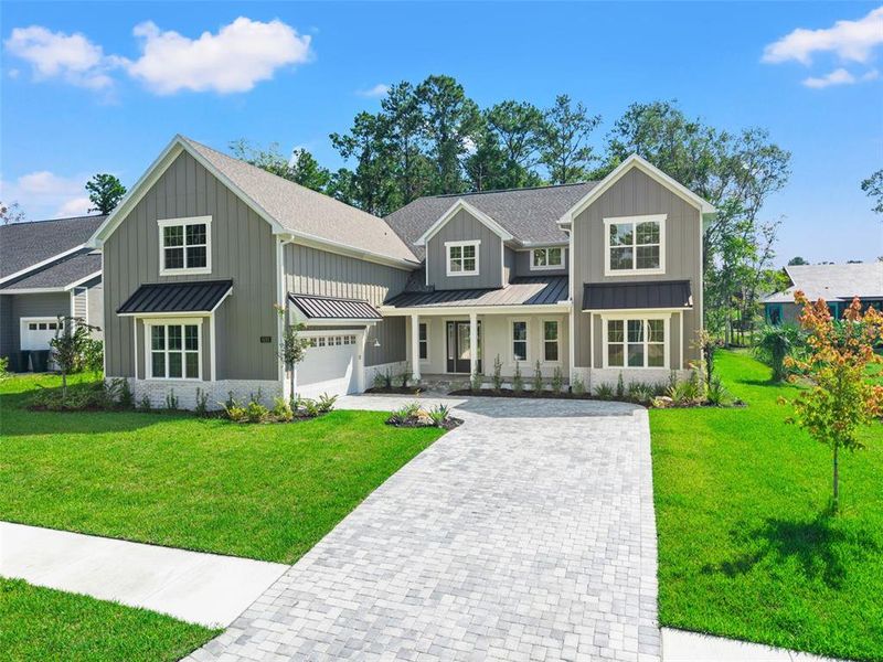 Front exterior of a new home in , Brooksville, FL, highlighting curb appeal (Image 25).