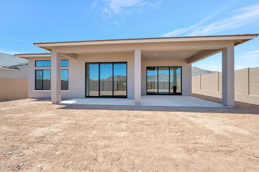 Exterior details and patio area of a home in Overlook at Verrado Regent Hills, Buckeye (Image 3).