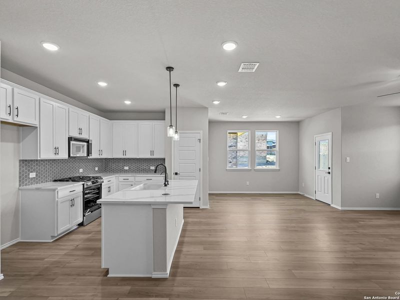 Furnished interior view inside a new home in Comanche Ridge, San Antonio (Image 3).