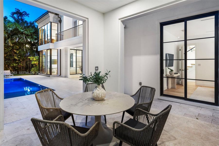 Exterior details and patio area of a home in , Coral Gables (Image 3).