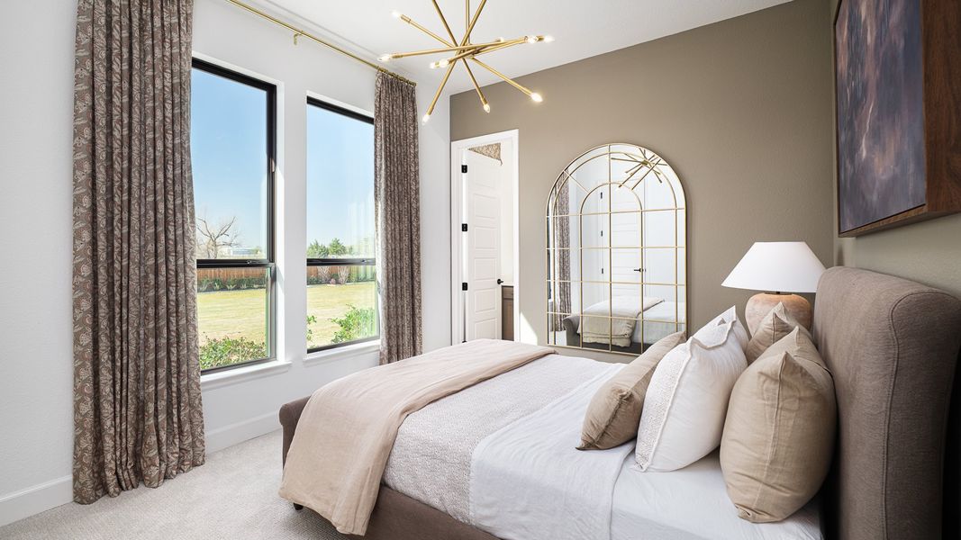 Representative furnished interior of a home built from the 3566W by Perry Homes in Somerset Park, Rockwall (Image 12).