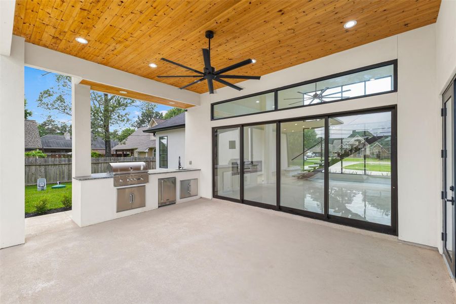 Exterior details and patio area of a home in , Magnolia (Image 4). Exterior details and patio area of a home in , Magnolia (Image 4).