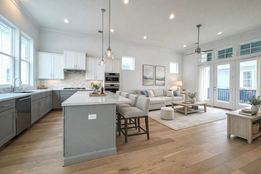 Soaring 12' ceilings and the 8' doors and all the natural light from the balcony door and full-length windows enhance the sense of space.   Virtual staging added.