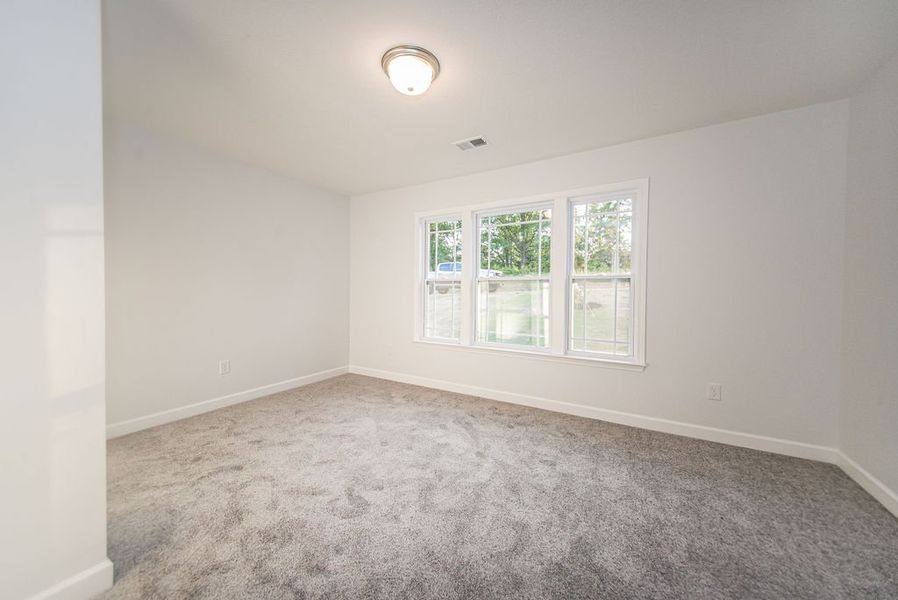 Representative unfurnished interior of a home built from the Arcadimont by Enchanted Homes in Lonesome Dove, San Antonio (Image 19).