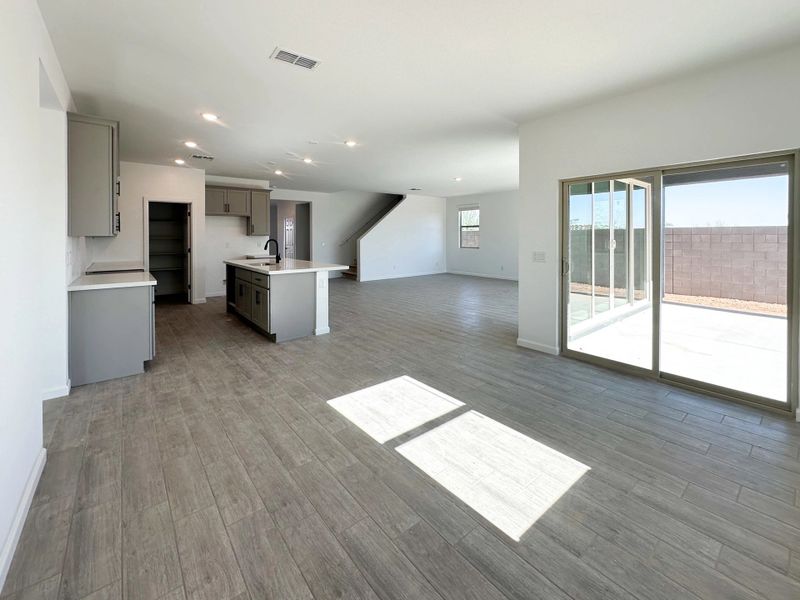 Dining into kitchen and great room Dining into kitchen and great room