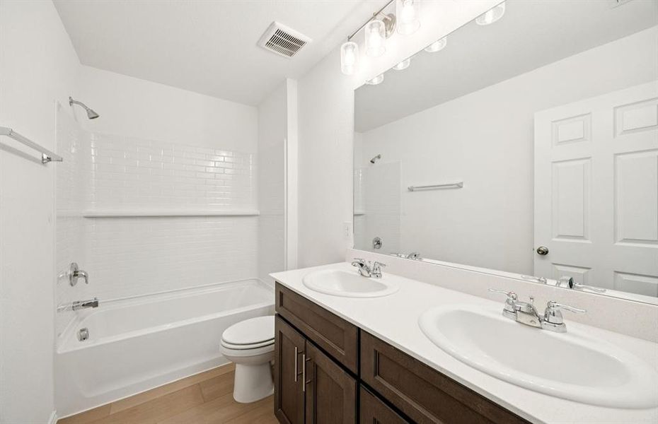 Spacious secondary bathroom with double sinks