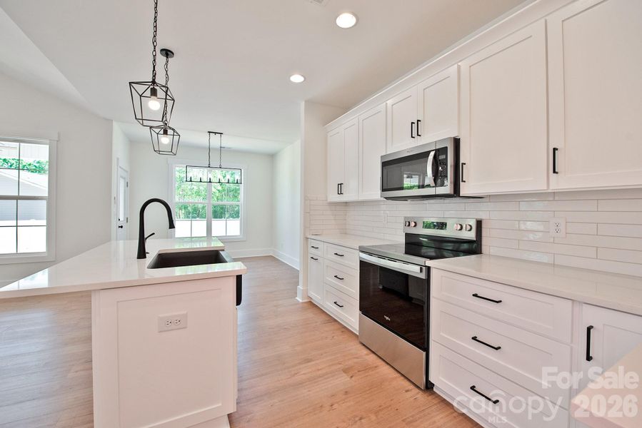 Furnished interior view inside a new home in , Concord (Image 9).