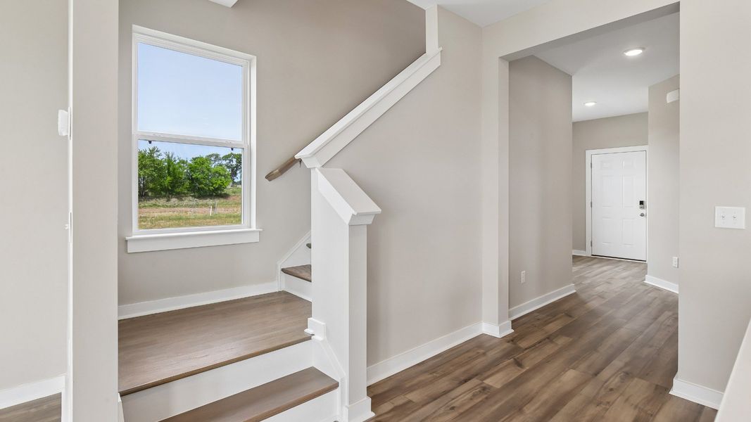 Stairway with oak treads and painted risers