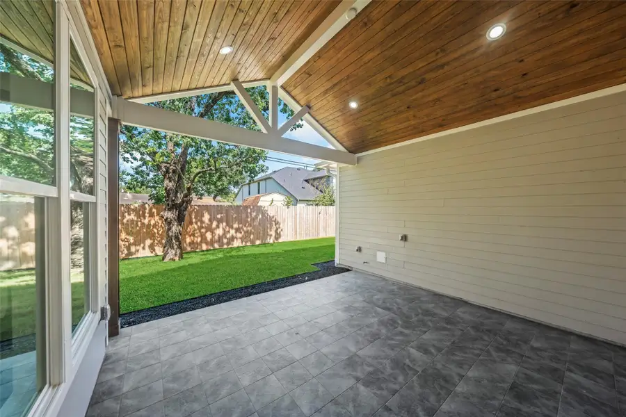 Exterior details and patio area of a home in , Houston (Image 3). Exterior details and patio area of a home in , Houston (Image 3).