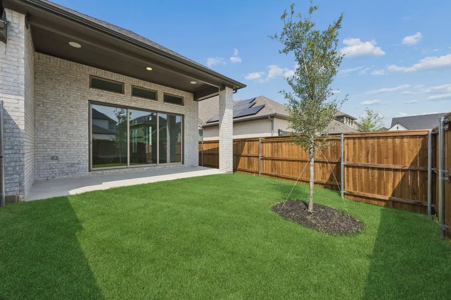 Exterior details and patio area of a home in The Grove Frisco, Frisco (Image 3).