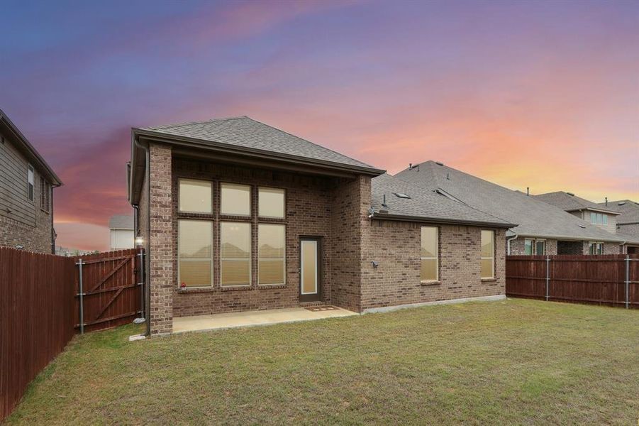 Exterior details and patio area of a home in Silverado, Aubrey (Image 27).