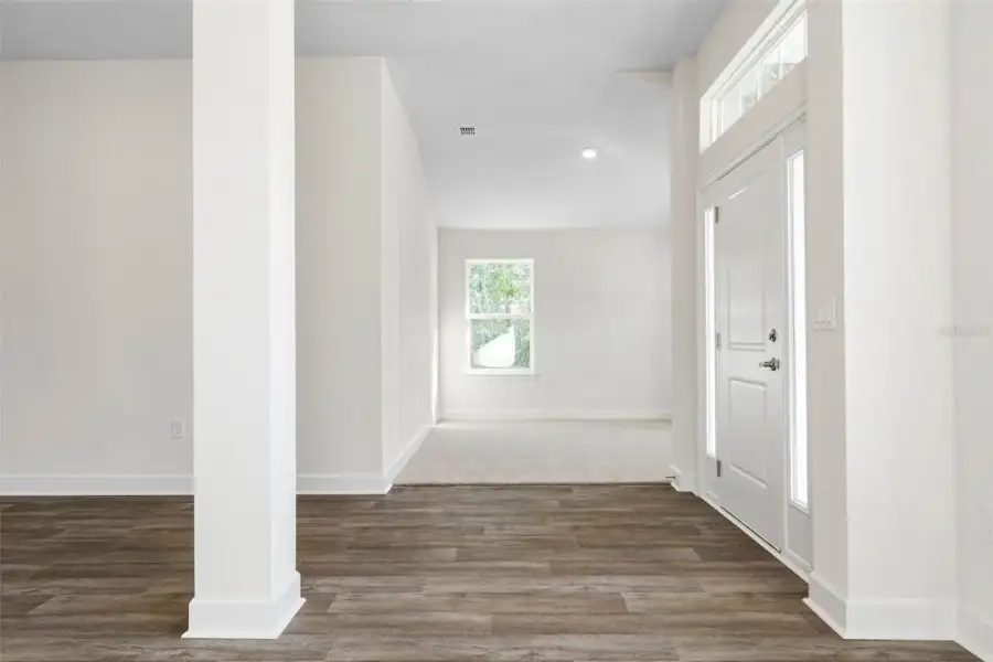 Representative unfurnished interior of a home built from the 2265 by Adams Homes in Flagler Estates, Hastings (Image 20).