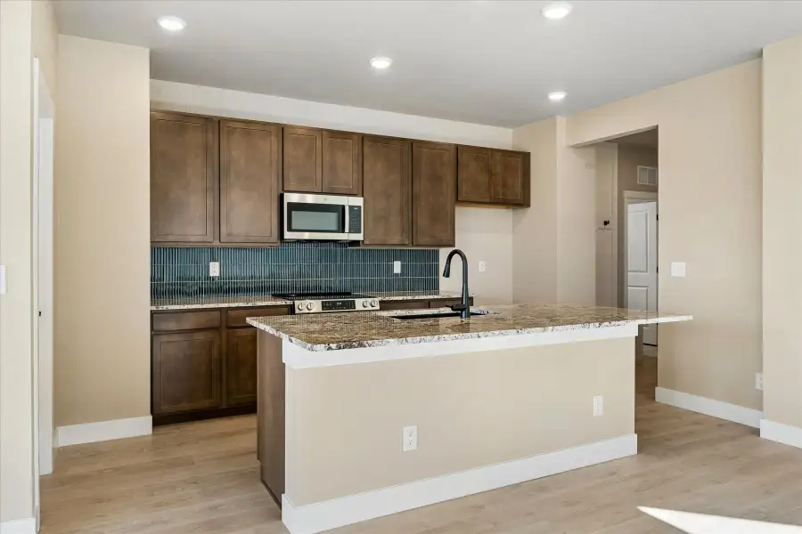 Furnished interior view inside a new home in The Trails at Aspen Ridge, Colorado Springs (Image 4). Furnished interior view inside a new home in The Trails at Aspen Ridge, Colorado Springs (Image 4).