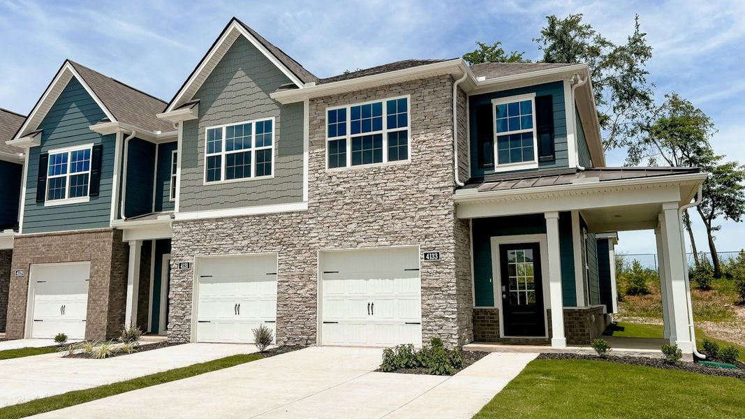 Front exterior of a new home in River Landing Townhomes, Murfreesboro, TN, highlighting curb appeal (Image 2).