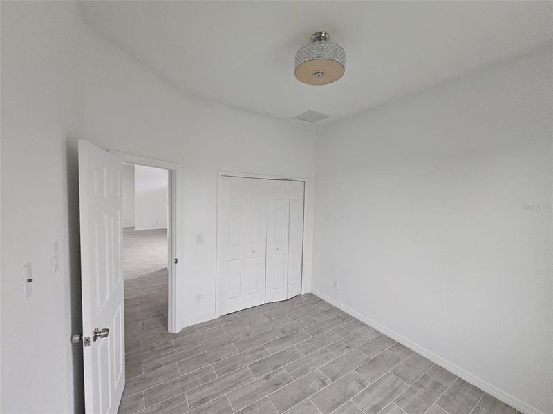 Spacious, unfurnished interior of a new home in , Port Charlotte (Image 8).