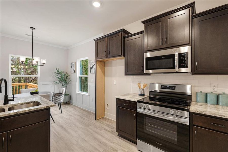 Furnished interior view inside a new home in Canterbury Villas, Carrollton (Image 8).