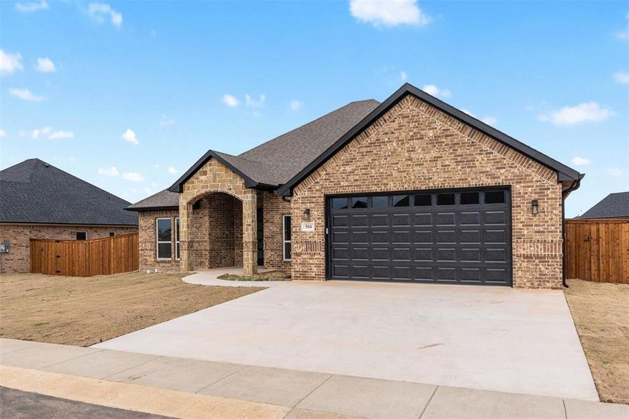 Front exterior of a new home in , Mabank, TX, highlighting curb appeal (Image 20).