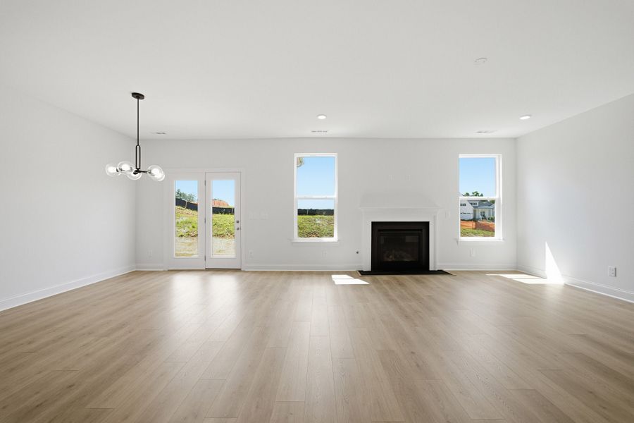 Spacious, unfurnished interior of a new home in Dorris Farm, White House (Image 43).