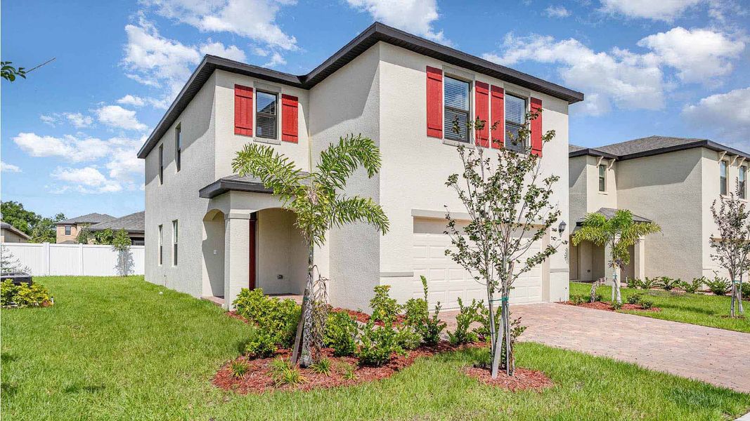 Representative exterior photo of a completed home built from the Hayden by D.R. Horton in Morningside, Fort Pierce, FL (Image 2).
