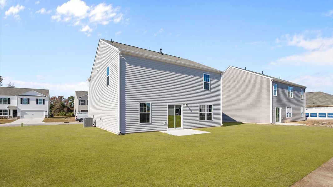 Exterior details and patio area of a home in Madeline Farm, New Bern (Image 17).