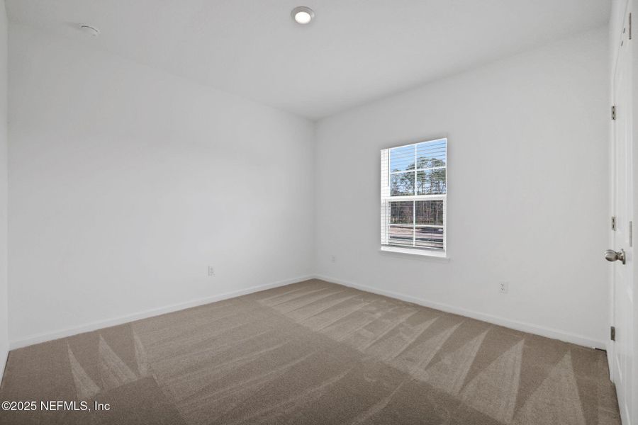 Spacious, unfurnished interior of a new home in TrailMark, St. Augustine (Image 40).