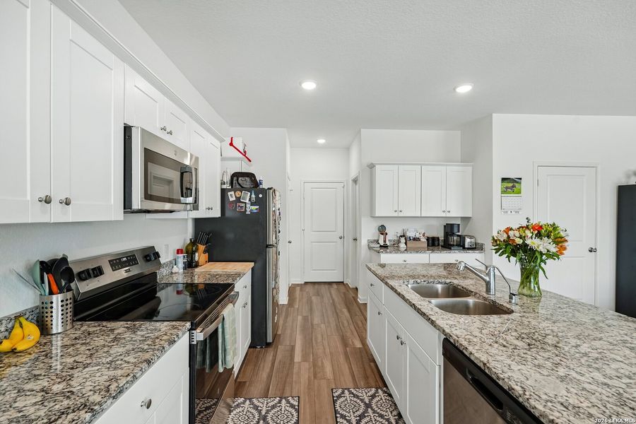 Furnished interior view inside a new home in Hennersby Hollow, San Antonio (Image 33).
