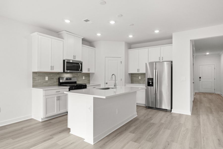 Furnished interior view inside a new home in Cypress Ridge - The Boardwalk Series, Longs (Image 4).