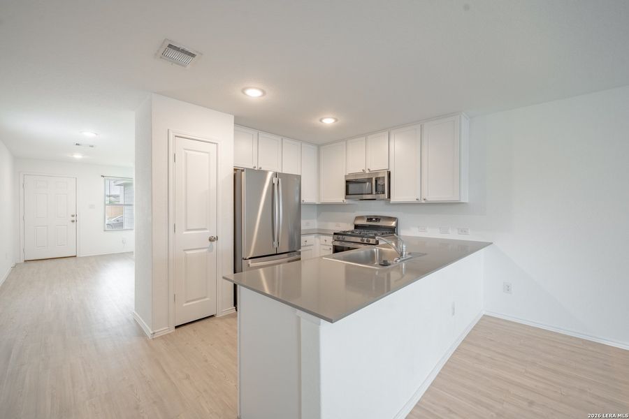Furnished interior view inside a new home in Waterwheel, San Antonio (Image 7).