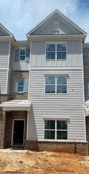 In-progress construction of a new home in Townes at South Main, Kennesaw, GA (Image 29).