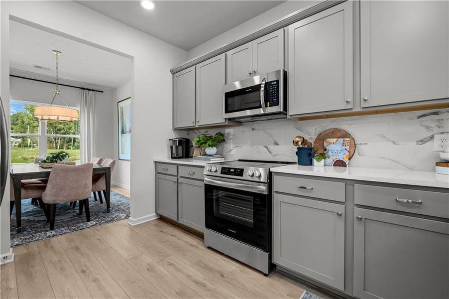 Furnished interior view inside a new home in Capstone Estates, Apison (Image 40).