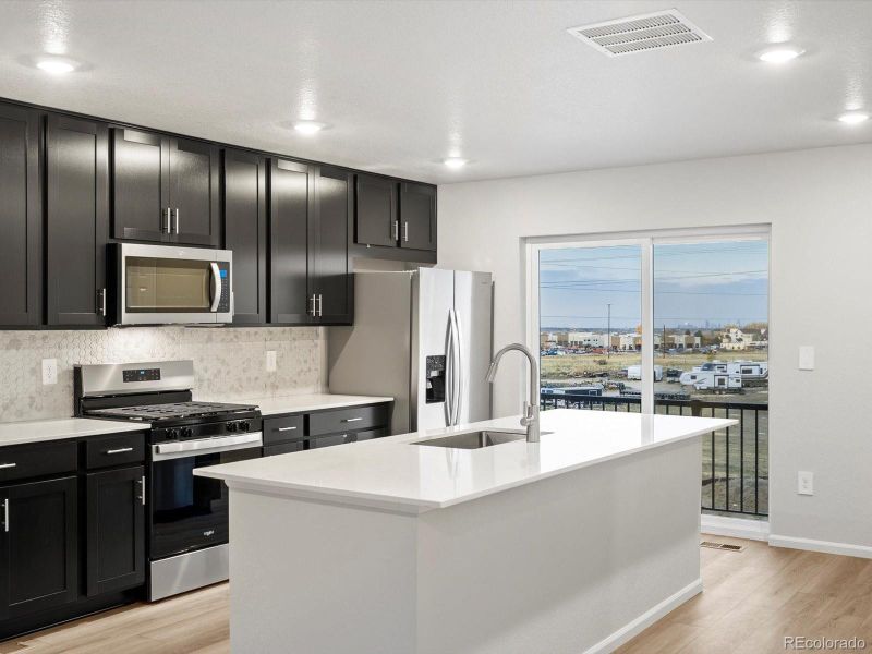 Furnished interior view inside a new home in Three Hills, Morrison (Image 13).