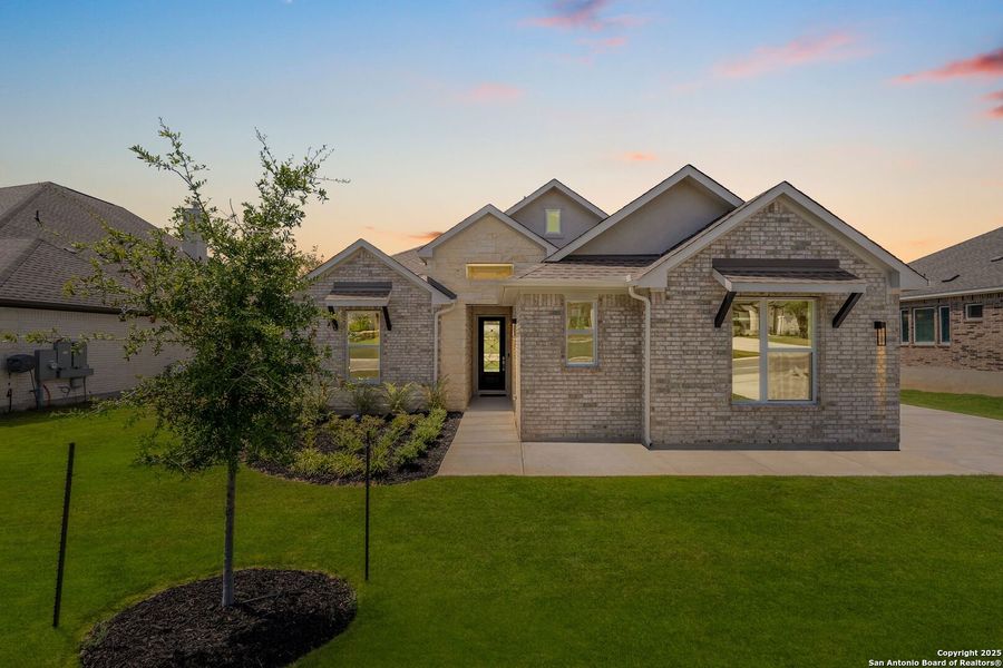 Front exterior of a new home in Arbors at Fair Oaks, Fair Oaks Ranch, TX, highlighting curb appeal (Image 1).