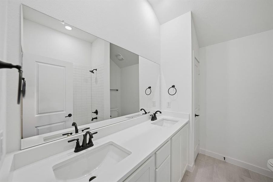 Furnished interior view inside a new home in Light Farms Brenham - 40' Lots, Celina (Image 8). Furnished interior view inside a new home in Light Farms Brenham - 40' Lots, Celina (Image 8).