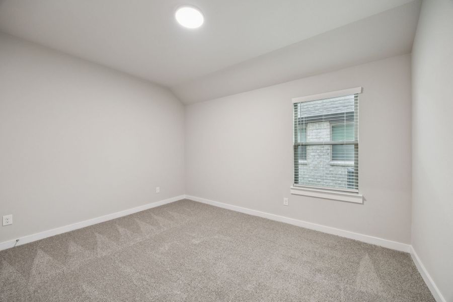 Bedroom in the Oscar home plan by Trophy Signature Homes – REPRESENTATIVE PHOTO Bedroom in the Oscar home plan by Trophy Signature Homes – REPRESENTATIVE PHOTO