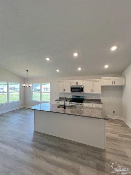 Furnished interior view inside a new home in Pine Top, Cantonment (Image 3).