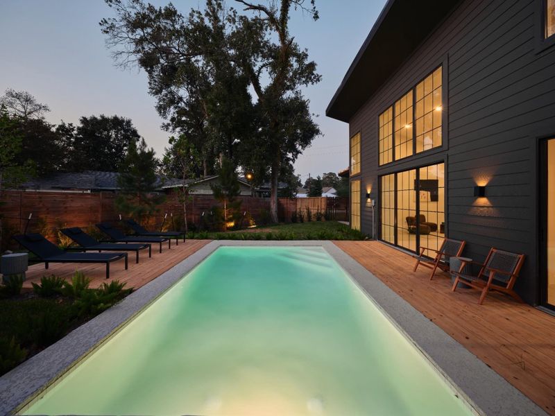 Exterior details and patio area of a home in , Conroe (Image 27).