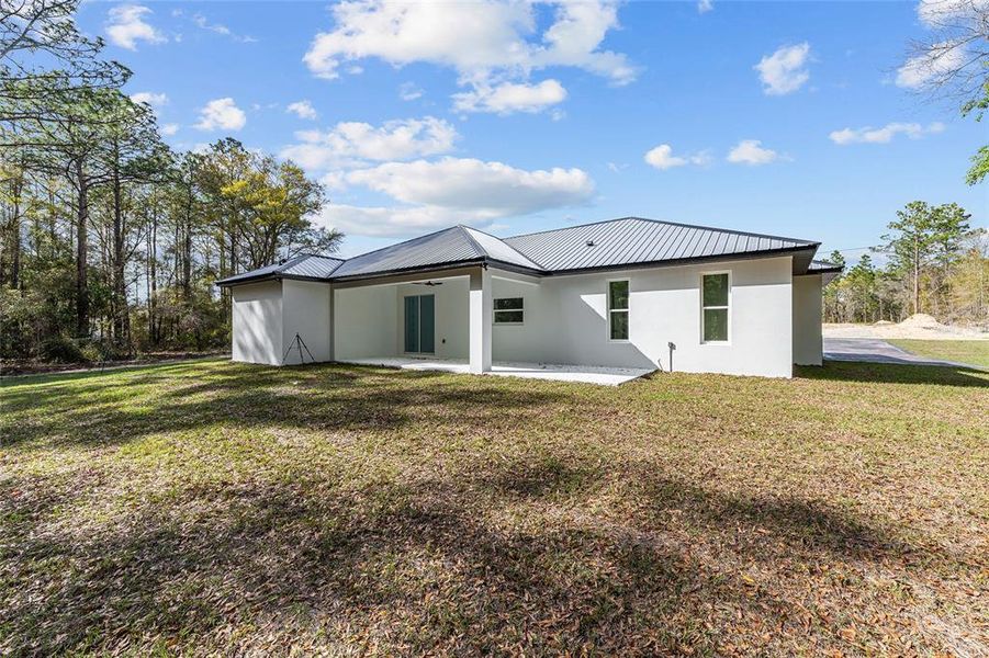 Exterior details and patio area of a home in , Ocala (Image 3).