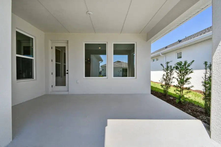 Representative exterior details of a home built from the The Ambrosia by David Weekley Homes in SeaFlower – Bungalow Homes, Bradenton (Image 3).