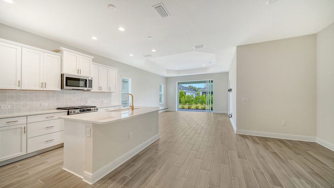 Furnished interior view inside a new home in Wildleaf at North River Ranch, Parrish (Image 5).