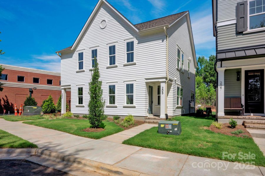 Front exterior of a new home in , Davidson, NC, highlighting curb appeal (Image 13).