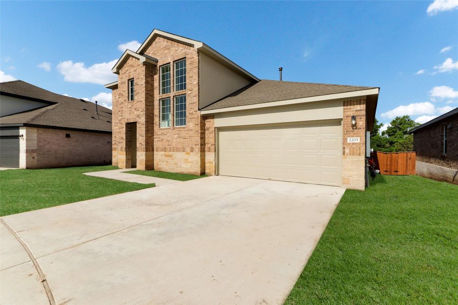 Exterior details and patio area of a home in Bar W Ranch, Leander (Image 1). Exterior details and patio area of a home in Bar W Ranch, Leander (Image 1).
