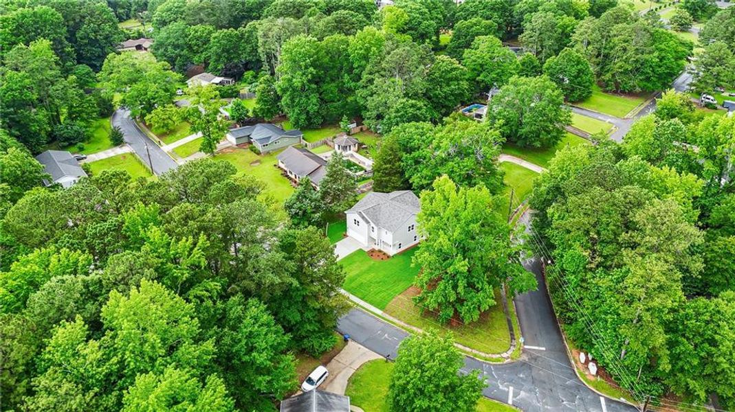 Front exterior of a new home in , Stockbridge, GA, highlighting curb appeal (Image 27).