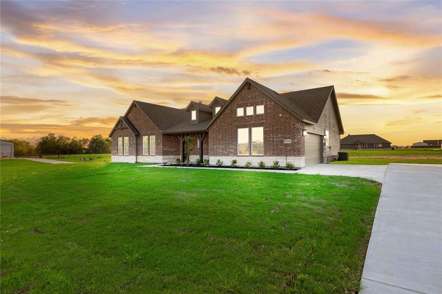 Front exterior of a new home in Oak Valley, Oak Ridge, TX, highlighting curb appeal (Image 28).