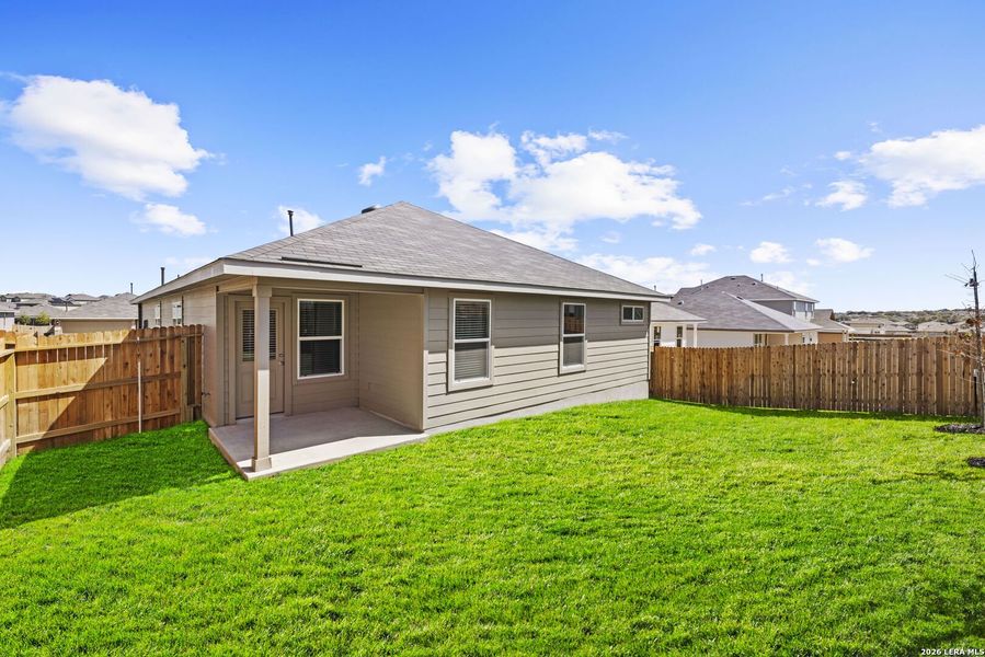 Exterior details and patio area of a home in Redbird Ranch, San Antonio (Image 2).