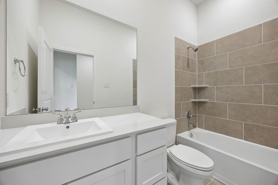 Furnished interior view inside a new home in Riviera Pines, Huffman (Image 12).