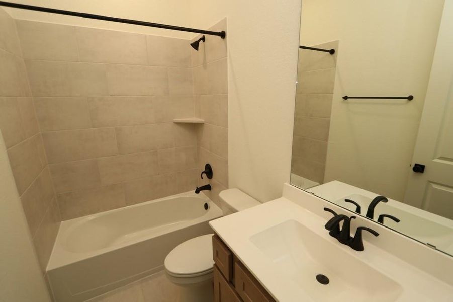 Furnished interior view inside a new home in Harvest Green 45', Richmond (Image 6).