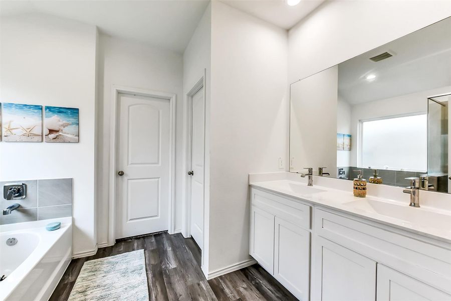 Furnished interior view inside a new home in Sunterra, Katy (Image 26).