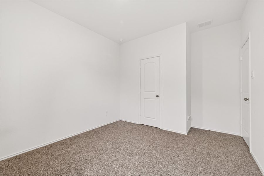 Spacious, unfurnished interior of a new home in Sunterra, Katy (Image 21).