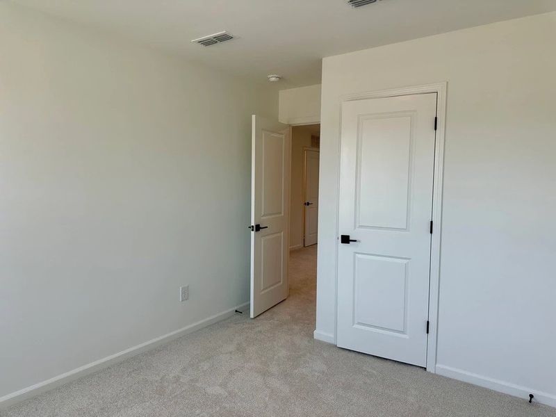 Bed 2 featuring the AW Collection® Rosemary - Natural tones and warmth create a soothing space.