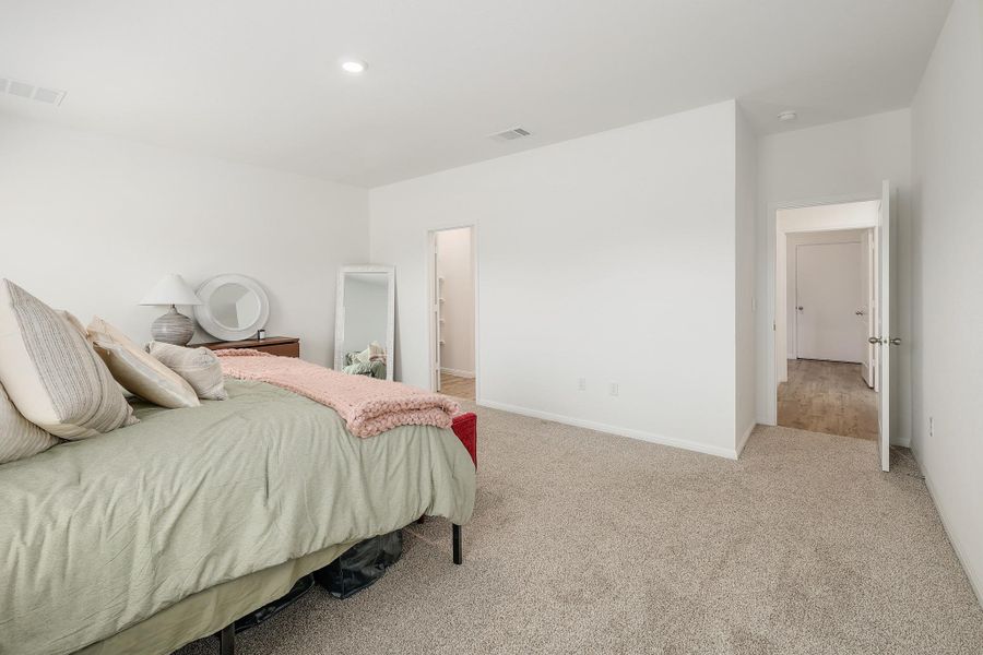 Carpeted room with recessed lighting and crisp white walls Carpeted room with recessed lighting and crisp white walls